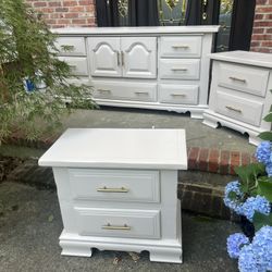 Refinished solid wood three piece set with the dresser and two end tables. 