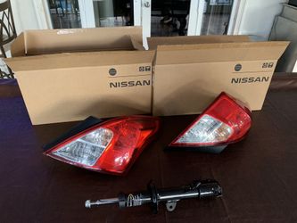 New Car break lights and New shock absorber nissan versa 2015