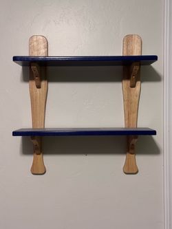 Baseball bat shelf