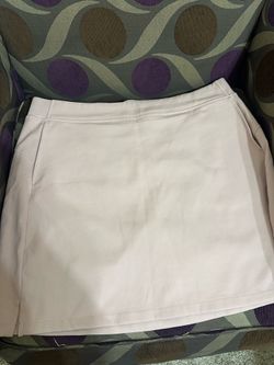 Pink skirt with pockets size L but fits a 14-16