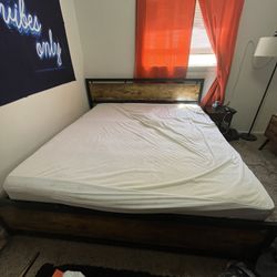 King size bed frame with California king mattress