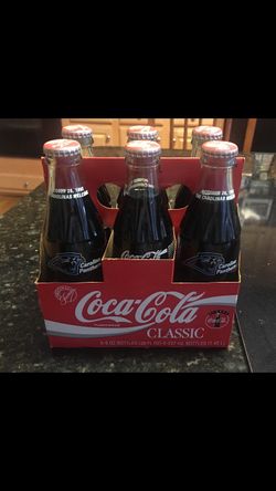 Collectible NC Panther coke bottles