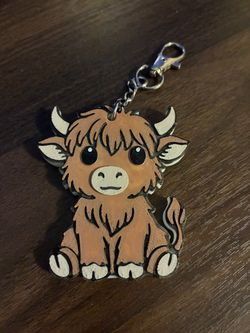 Cow can opener/keychain