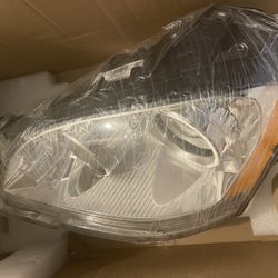 Left Driver Side Headlight Assembly - 2009-2011 Mercedes-Benz ML350 (For Non Xenon Lighting Systems) - Hella W0133-1925281