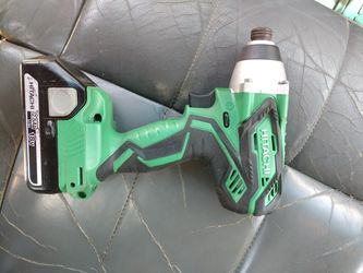 Hatachi drill with battery.