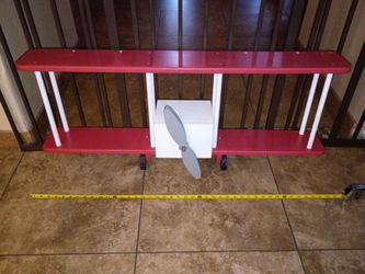 Airplane shelf hanging