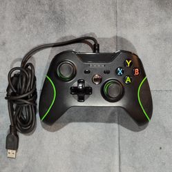 SONY X-BOX ONE WIRED CONTROLLER MODEL WTYX-618 BLACK & GREEN IT IS IN EXCELLENT CONDITION THERE IS NO DAMAGE WHATSOEVER.