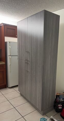 Tall Gray Storage Cabinet