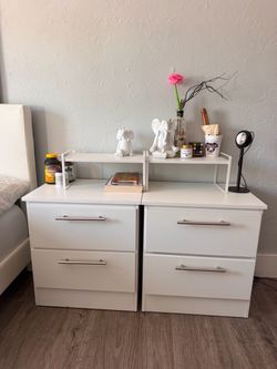 White Kingsized bed and matching side tables