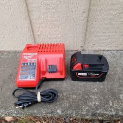 MILWAUKEE 12V-18V CHARGER AND 1 18V 8AH AFTERMARKET BATTERY