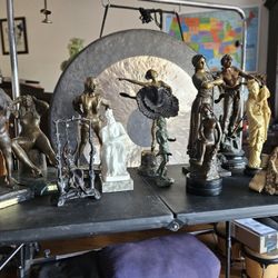 Collection of bronze, marble, spelter, and resin statues.