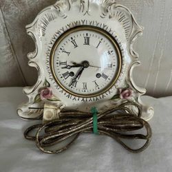 Porcelain clock maybe antique/collectibleMade in America approx H6” X W 7”