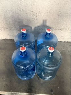 Four 5 gallon Water Bottles