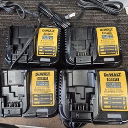  4 NEW DEWALT 20V BATTERY CHARGERS AND USED 4 AMP HR BATTERIES 