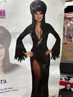 New, Women’s Elvira Costume size Small. Comes with dress and belt