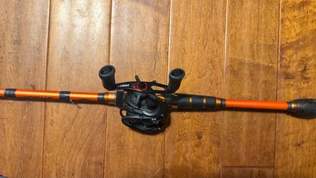 Abu Garcia Max baitcaster + Berkley casting rod.
