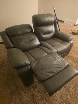 Gray Leather Reclining Loveseat
