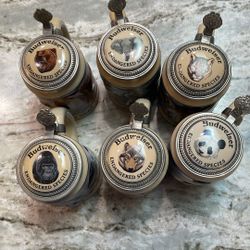 6 vintage ceramic beer steins from the Anheuser-Busch "Endangered Species" collection,