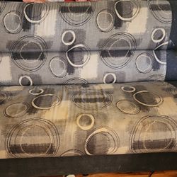 Futon couch with underneath storage built-in