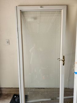 Storm door glass