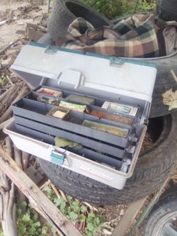 Tackle fishing box full of hook,weights , and other fishing items