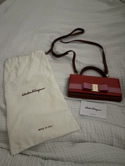 Ferragamo pink and red bow leather purse