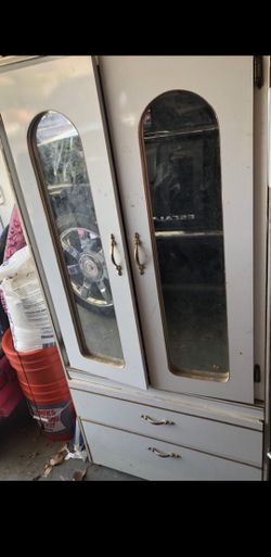 White and gold armoire