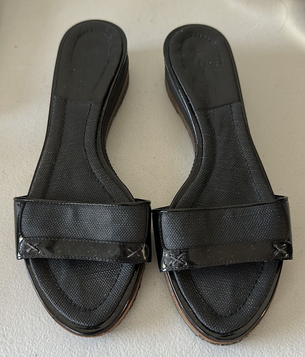 Chanel black canvas leather sandals mules slides slip on in flats