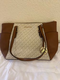 Brown and White Michael Kors bag