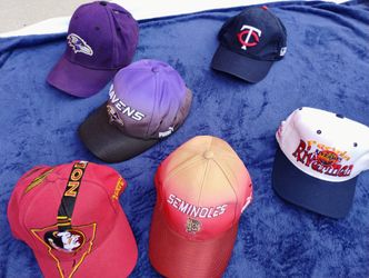 MANY NEW/LIKE NEW SPORTS TEAM BALL CAPS. WILL SELL AS LOT OR INDIVIDUALLY 