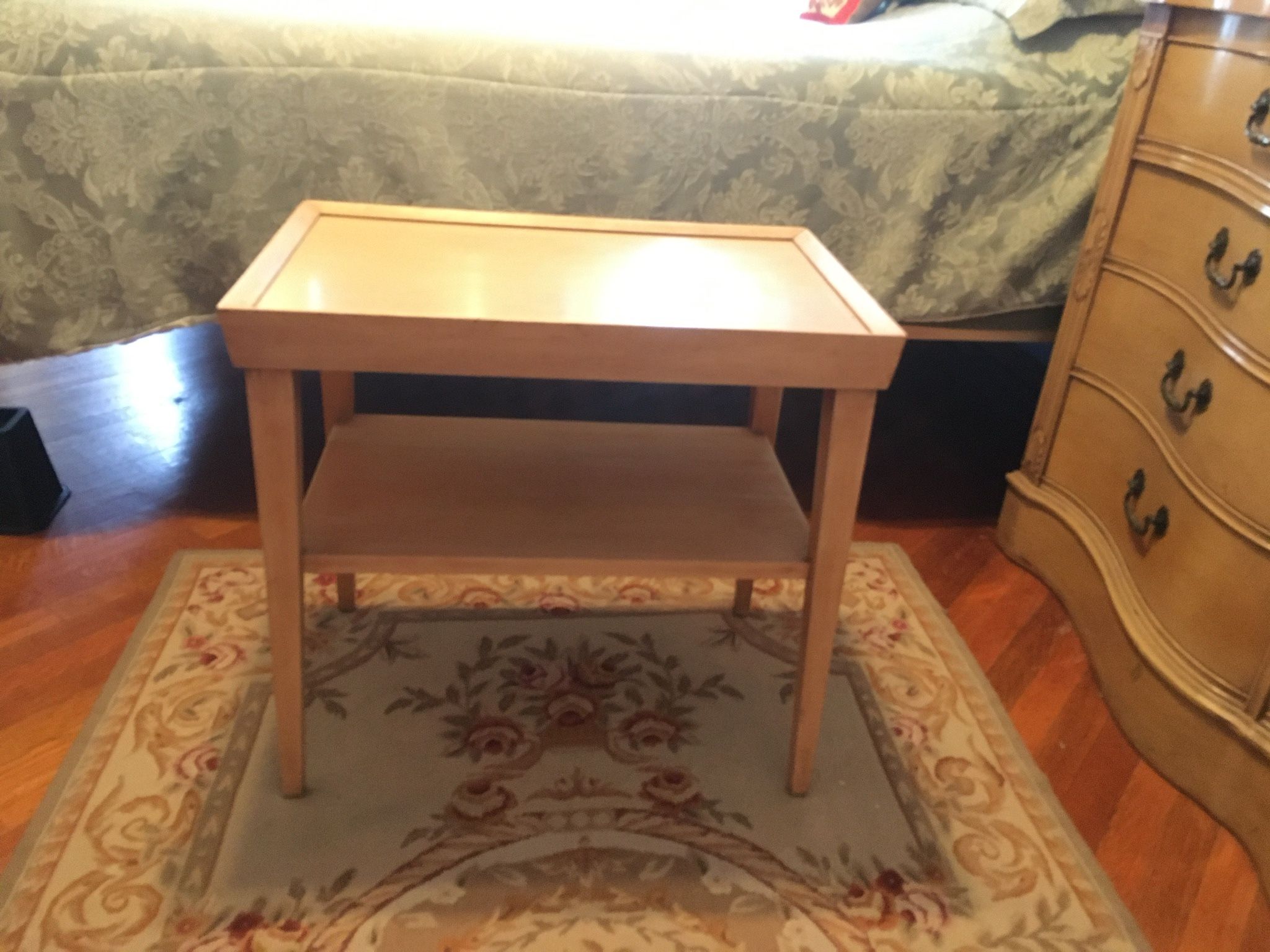 Small table framed top with shelf underneath. Great condition.
