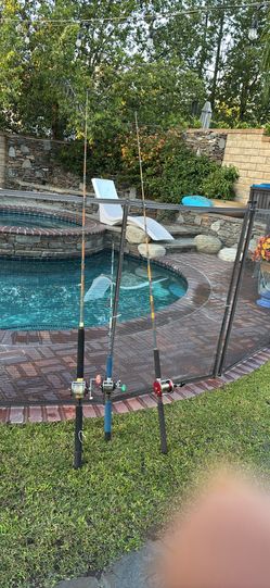 THREE (3) custom wrapped saltwater fishing rods with Penn Reels all three combos for $125.