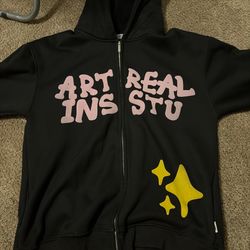 A Black Zip Up Hoodie