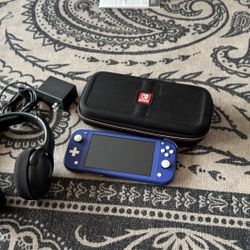 Switch lite (blue) With Case, Charger, 32gb Sd Card, And Headset