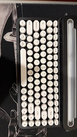 Black and white multi purpose wireless keyboard
