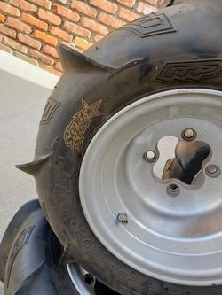 2 Sets rear sand tires w/rim's and 1 extra