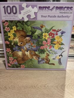 Bits and Pieces 100-piece jigsaw puzzle titled "A Touch of Spring”