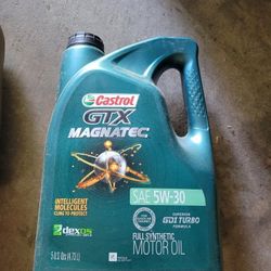 5 1/2 Quarts Of Motor Oil (New/opened)