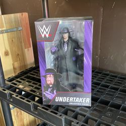 Undertaker WWE PCS figurine New In Box