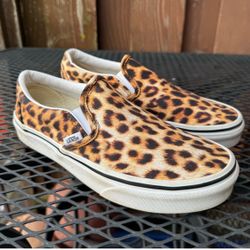 Vans leopard print slip on shoes in size women's 5.5