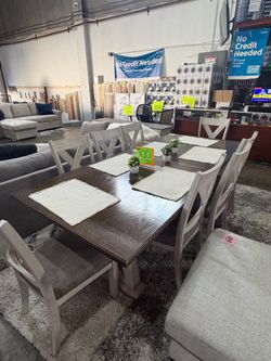 Dining Set with 8 grey fabric chairs from Costco