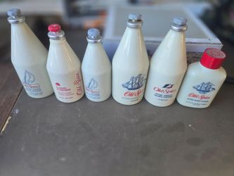 Glass old spice bottles - empty and partially full