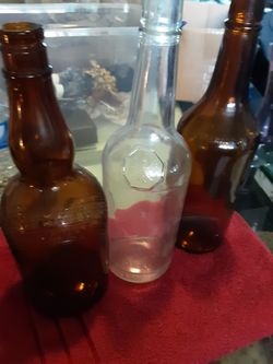 Lot of 3 vintage liquor bottles