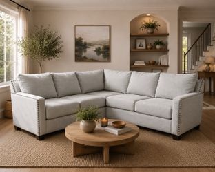 Light Gray L-Shaped Sectional Sofa with Nailhead Trim