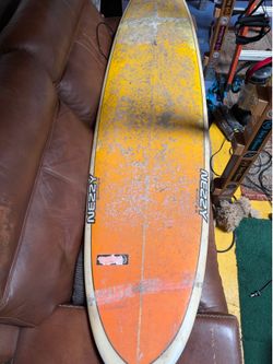 Surfboard with leash and extra custom fin $60