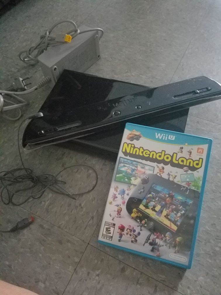 Nintendo wii u console with 9 games no pad pick up