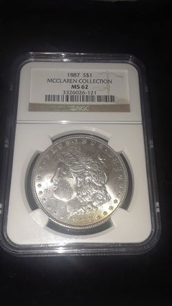 NGC 1887 McClaren collection ms62 Morgan dollar with champagne color toning by date