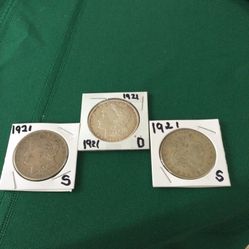 SILVER SALE. MORGAN SILVER DOLLARS 105.00 
