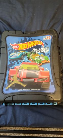 Hot wheels and a car case