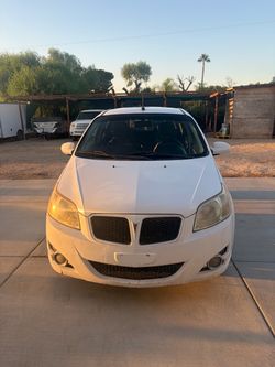 Pontiac G3 White Sedan